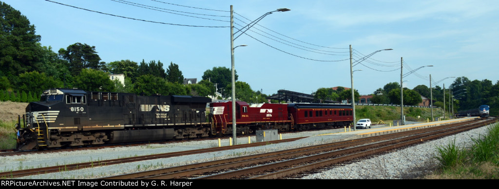 NS research and test train parked at Lynchburg.  Amtrak Regional #66 making station stop in the background. 